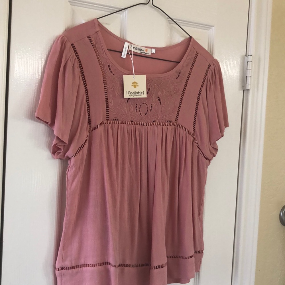 Love this shirt!  Beautiful peach color!